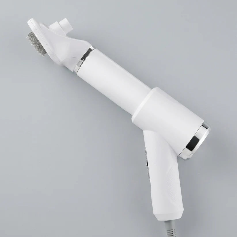 PawDry grooming dryer brush in white with the slicker brush head attached, shown on a plain grey background