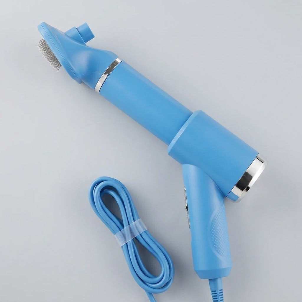PawDry grooming dryer brush in blue with its coiled cord, shown on a plain grey background