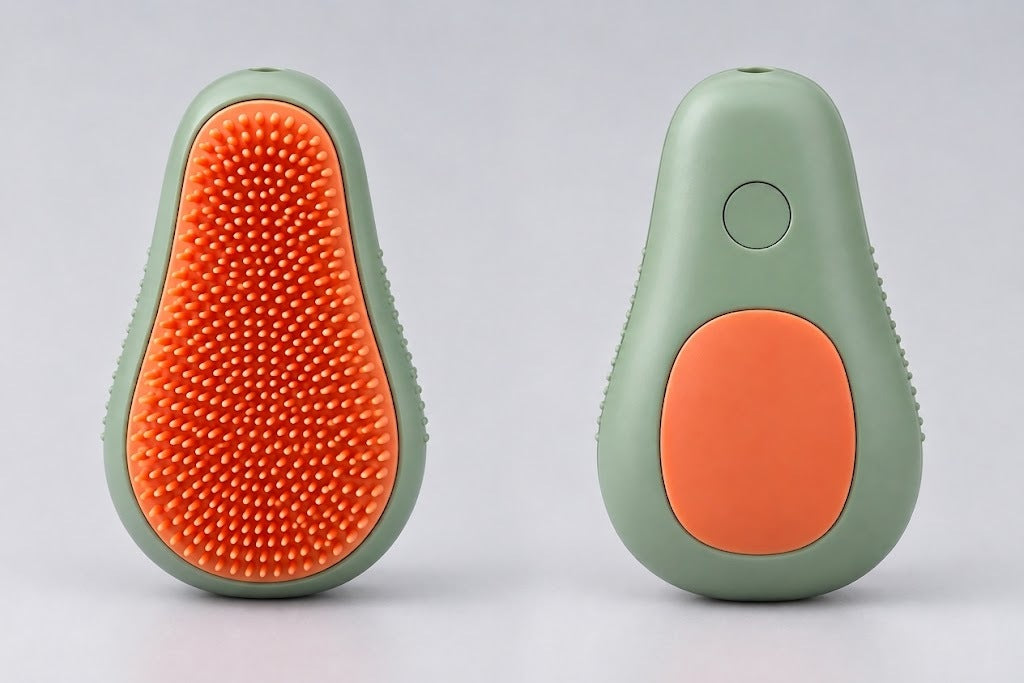 3-in-1 pet spa brush in sage green, front and back, showing the orange silicone bristles and the shampoo button